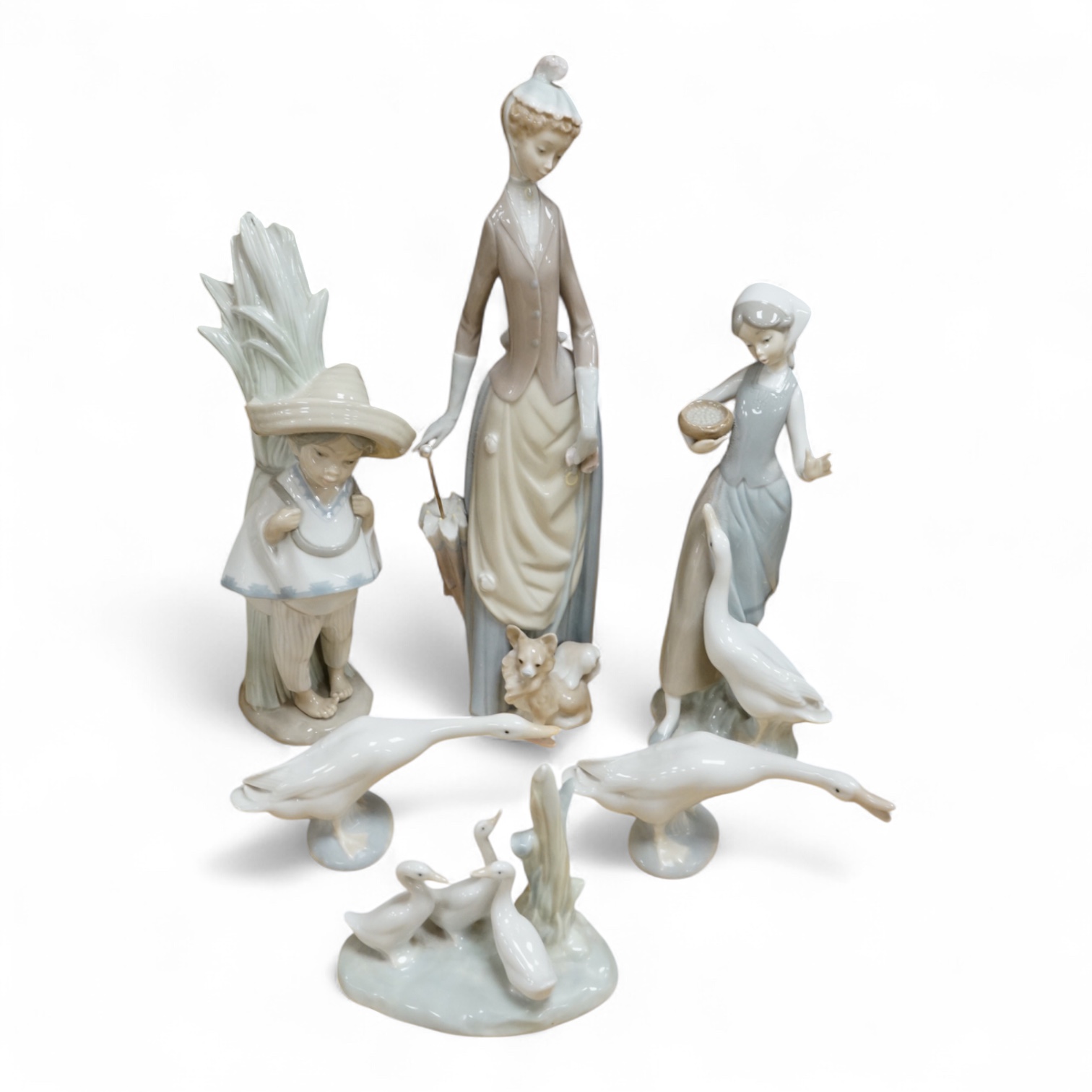Five Lladro figures and one other, tallest 37cm high